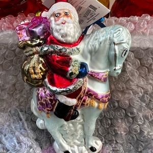Vintage Christopher Radko, Santa, riding a horse, tag attached